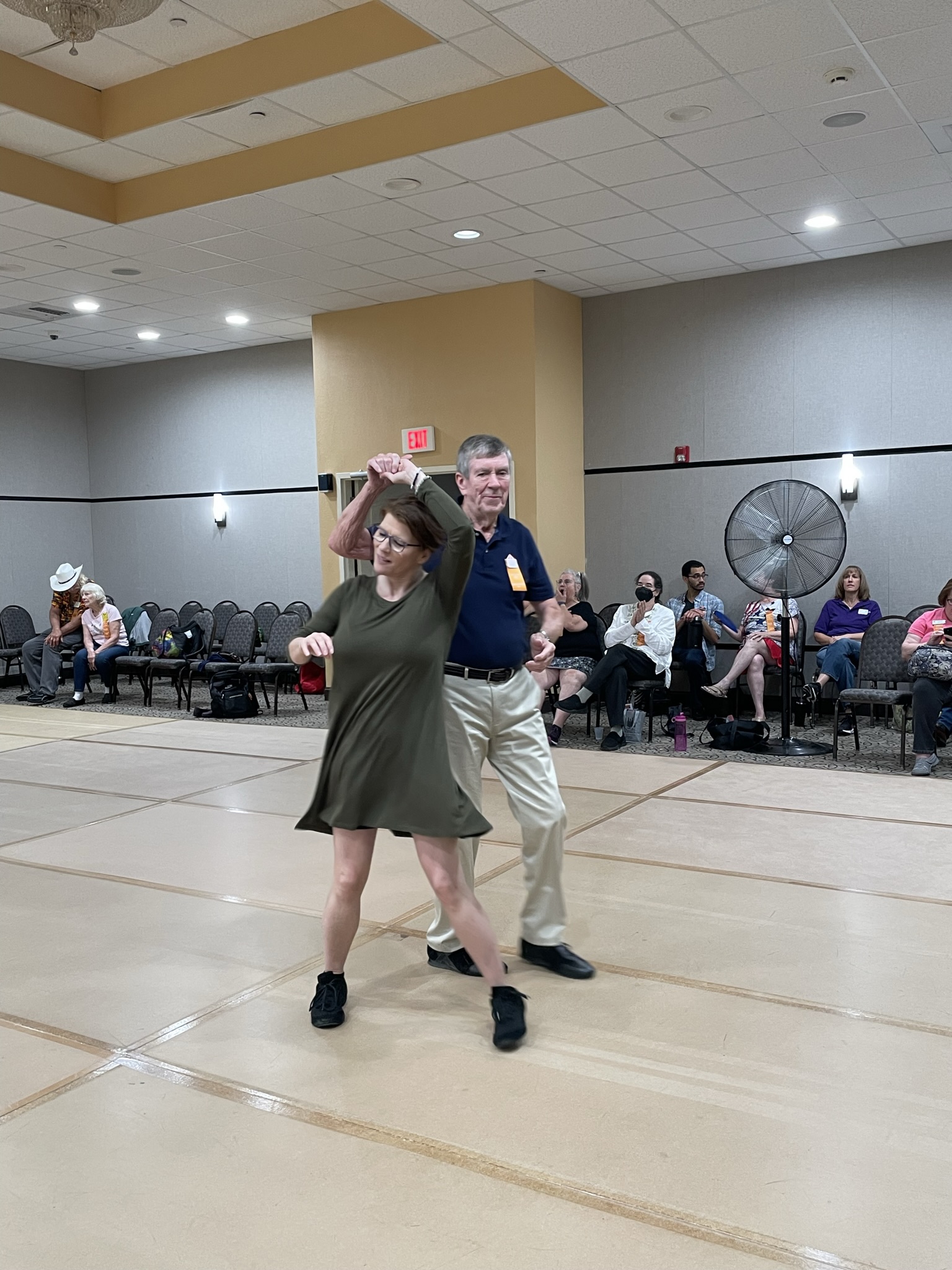 Photo of Jim and Angie dancing rounds